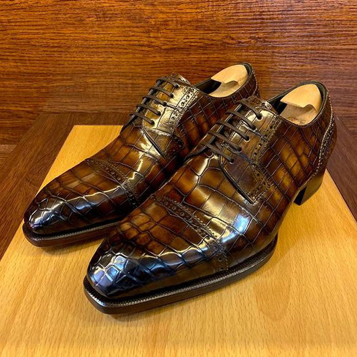 Brown and black men's classic derby shoes